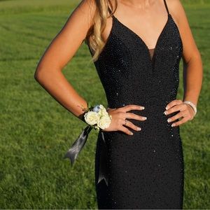Black prom dress with black rhinestones, a train (pins up), and an open back!